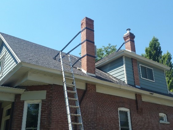 Reinforcing brick chimneys for earthquake hazard mitigation